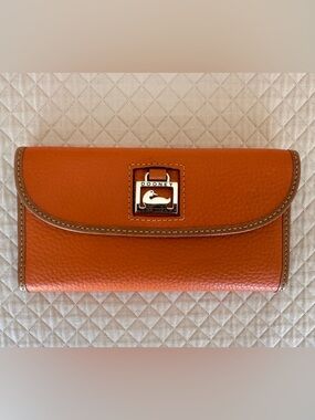 Dooney & Bourke Orange Leather Continental Wallet with Tan Trim